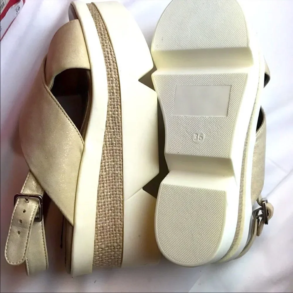 Bruno Ricci for Diane B. platform sandals.…
